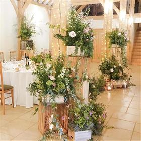 fwthumbRivervale Barn wedding breakfast rustic crates, grasses, candles, meadows.jpg